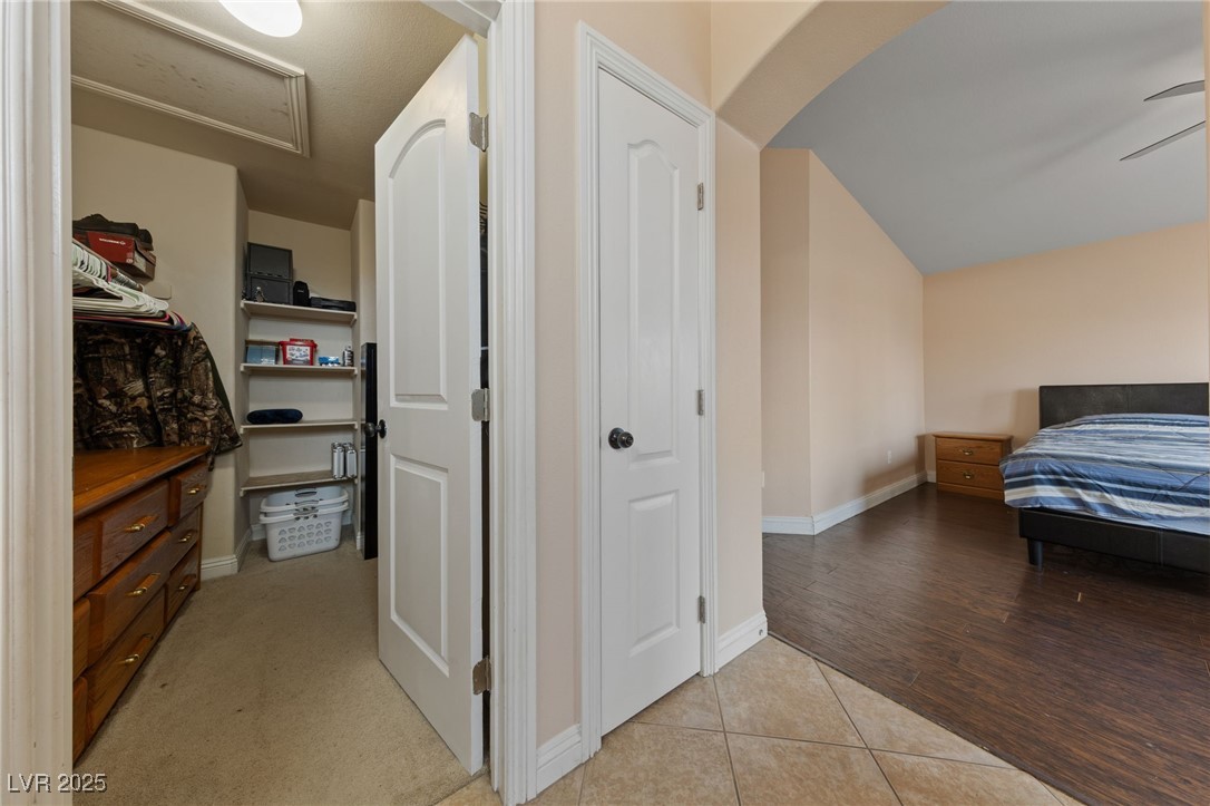 9068 Bushy Tail Avenue, Unit 103 Las Vegas, NV 89149 - Photo 6 of 32 View of walk in closet in Primary Bedroom
