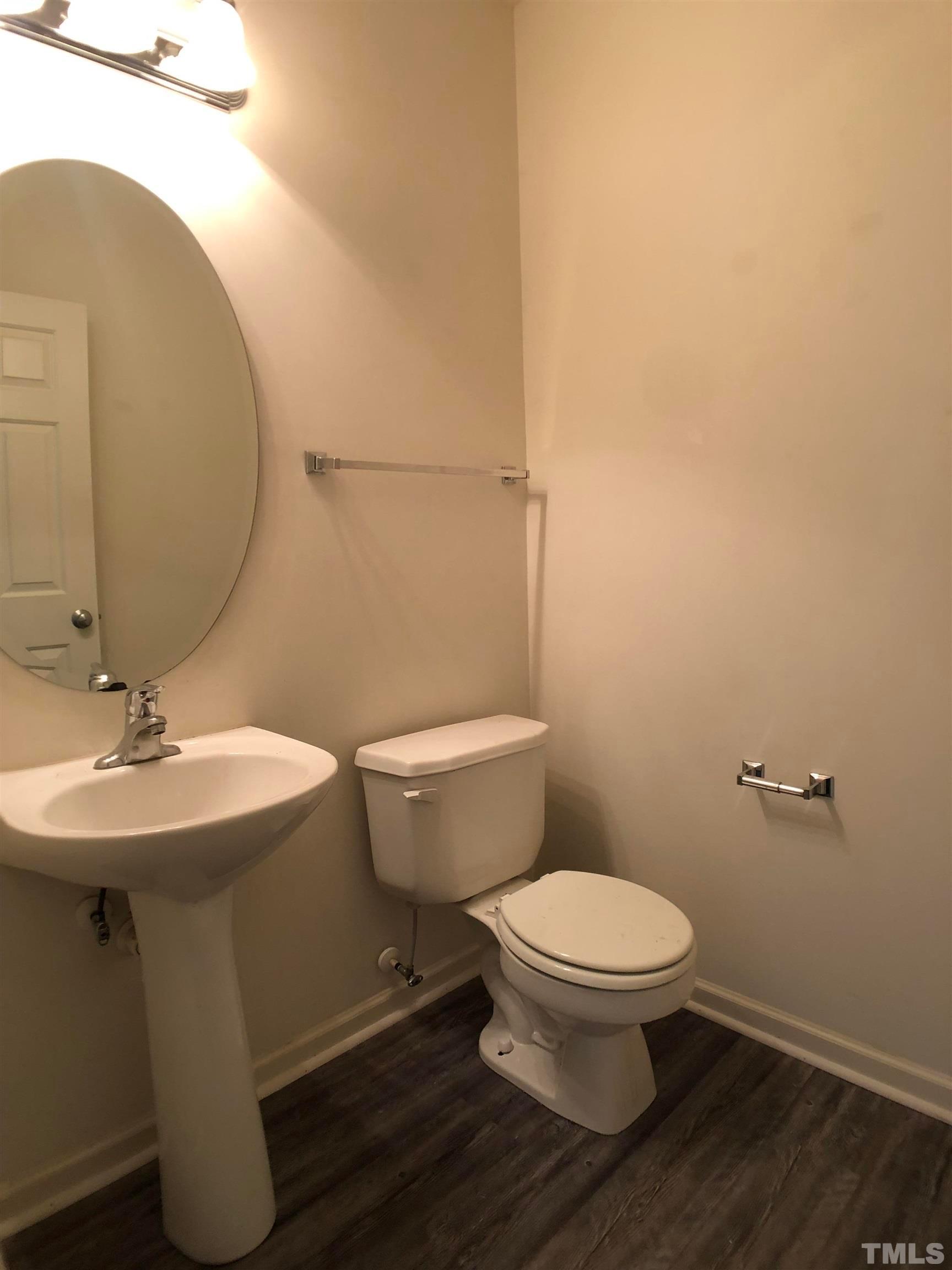 405 Hanson Road Durham, NC 27713 - Photo 14 of 27 a bathroom with a sink and a toilet