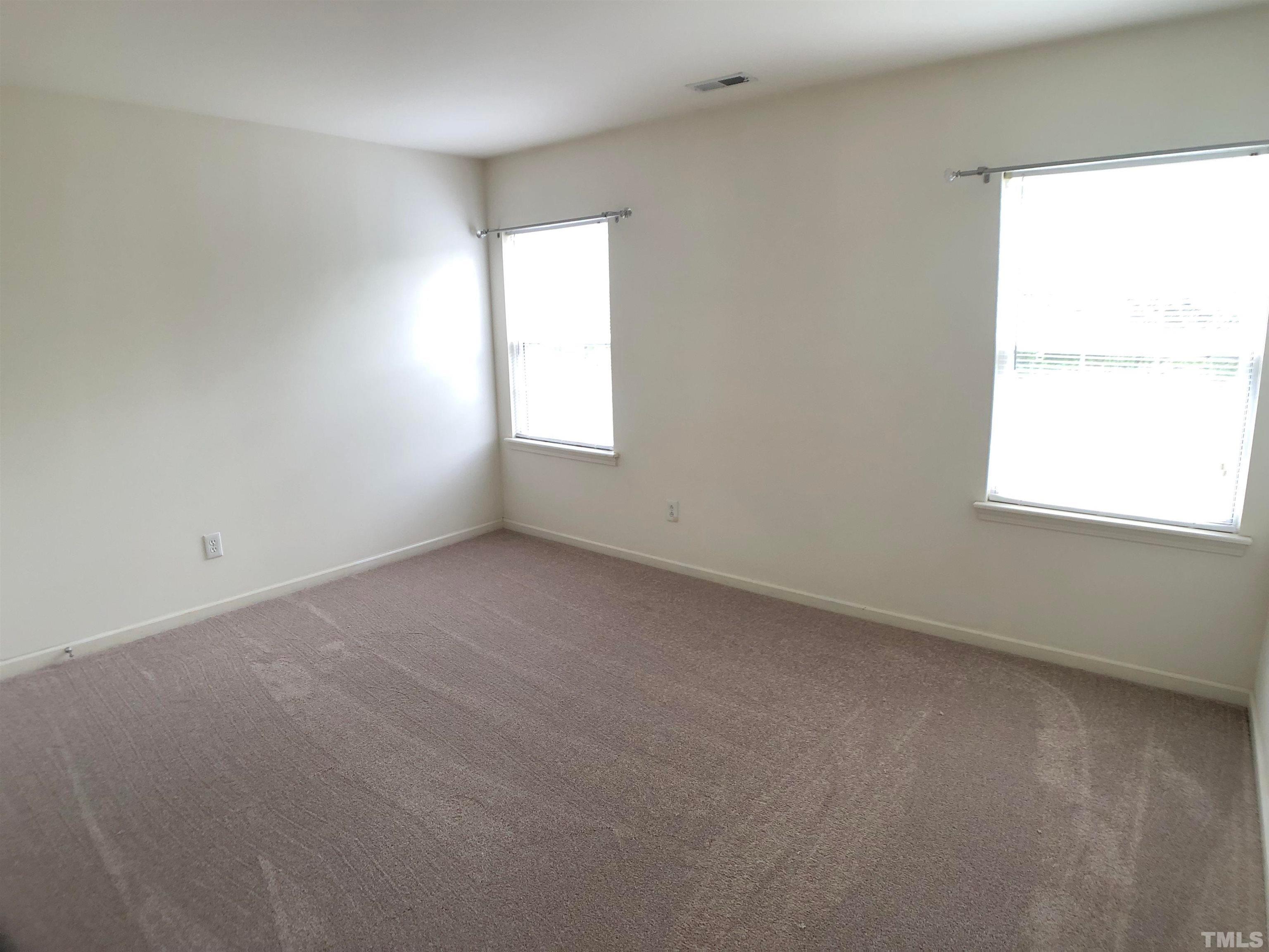 405 Hanson Road Durham, NC 27713 - Photo 20 of 27 an empty room with a window