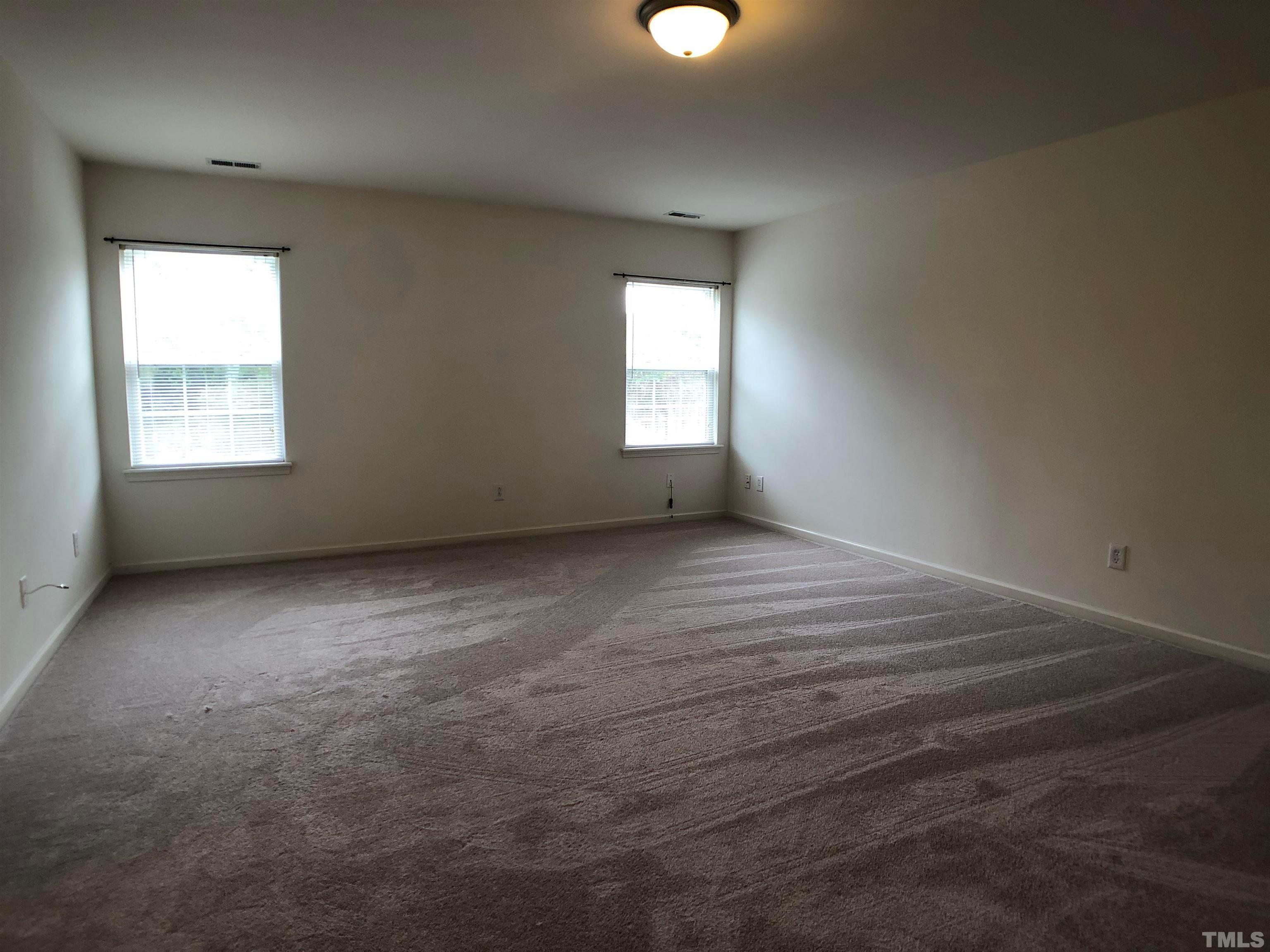 405 Hanson Road Durham, NC 27713 - Photo 22 of 27 an empty room with a window