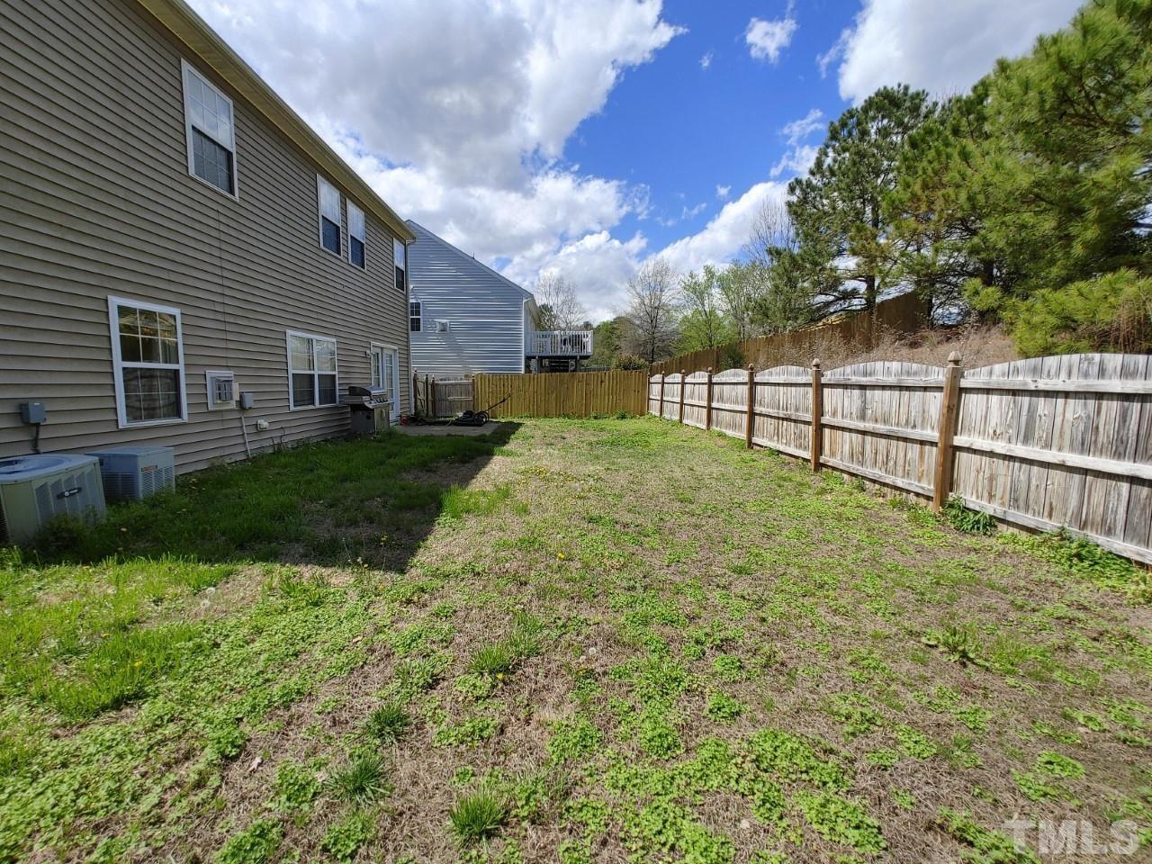 405 Hanson Road Durham, NC 27713 - Photo 27 of 27 a view of backyard with green space