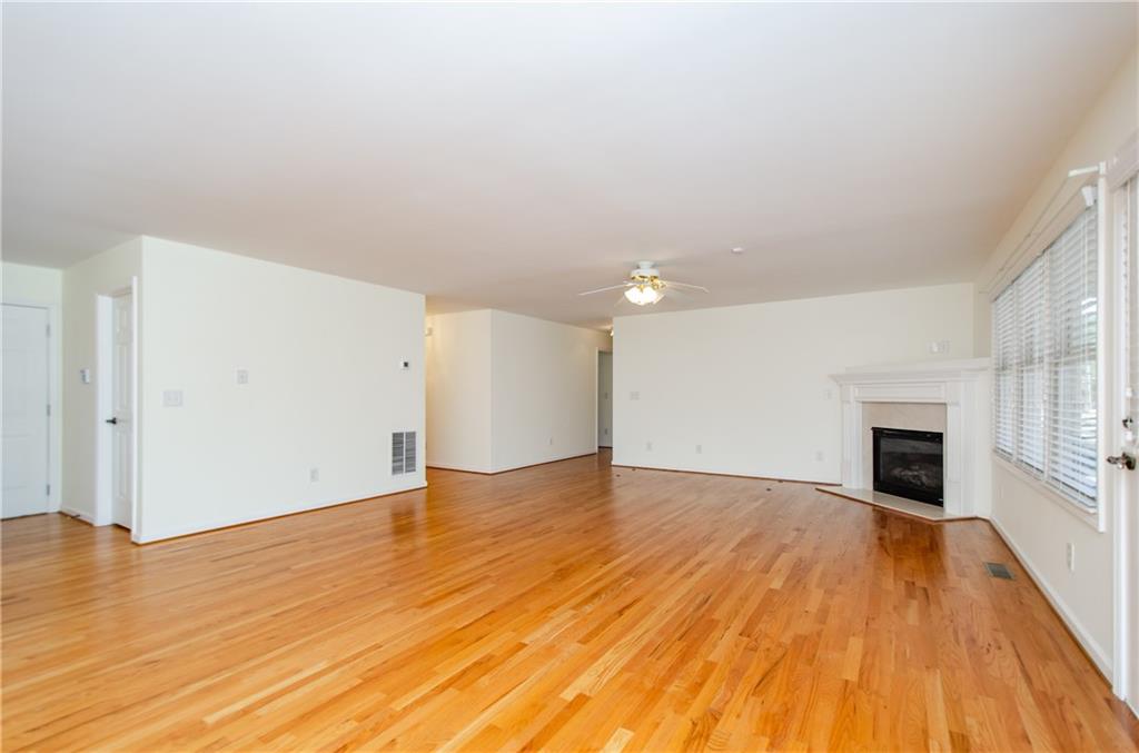 3950 Chattahoochee Road Cumming, GA 30041 - Photo 13 of 45 a view of empty room with wooden floor