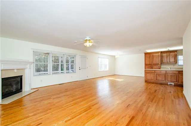 a view of a livingroom with wooden floor