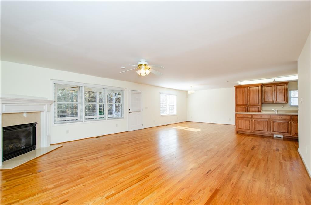 3950 Chattahoochee Road Cumming, GA 30041 - Photo 14 of 45 a view of a livingroom with wooden floor