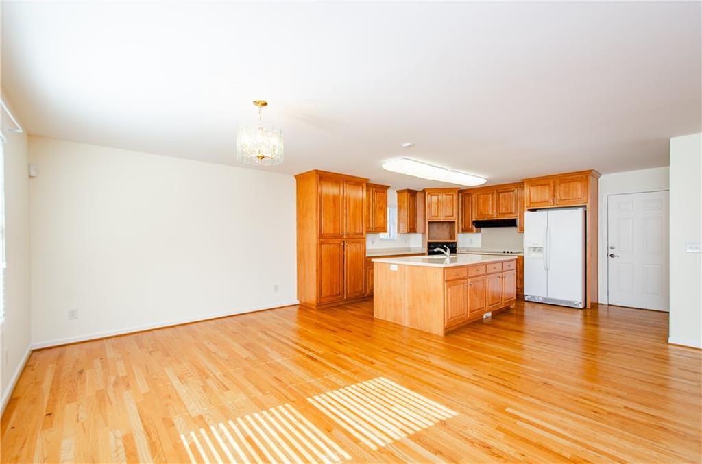 3950 Chattahoochee Road Cumming, GA 30041 - Photo 16 of 45 a view of kitchen with wooden floor