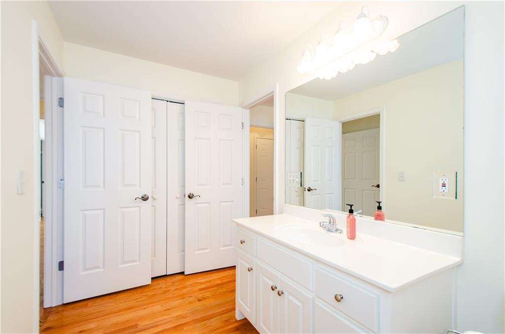 3950 Chattahoochee Road Cumming, GA 30041 - Photo 35 of 45 a bathroom with a sink and a mirror