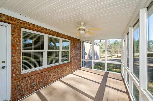 a view of a house with a large window