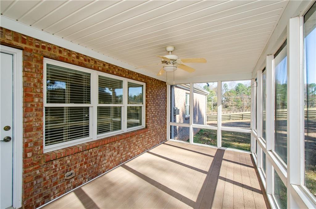 3950 Chattahoochee Road Cumming, GA 30041 - Photo 39 of 45 a view of a house with a large window
