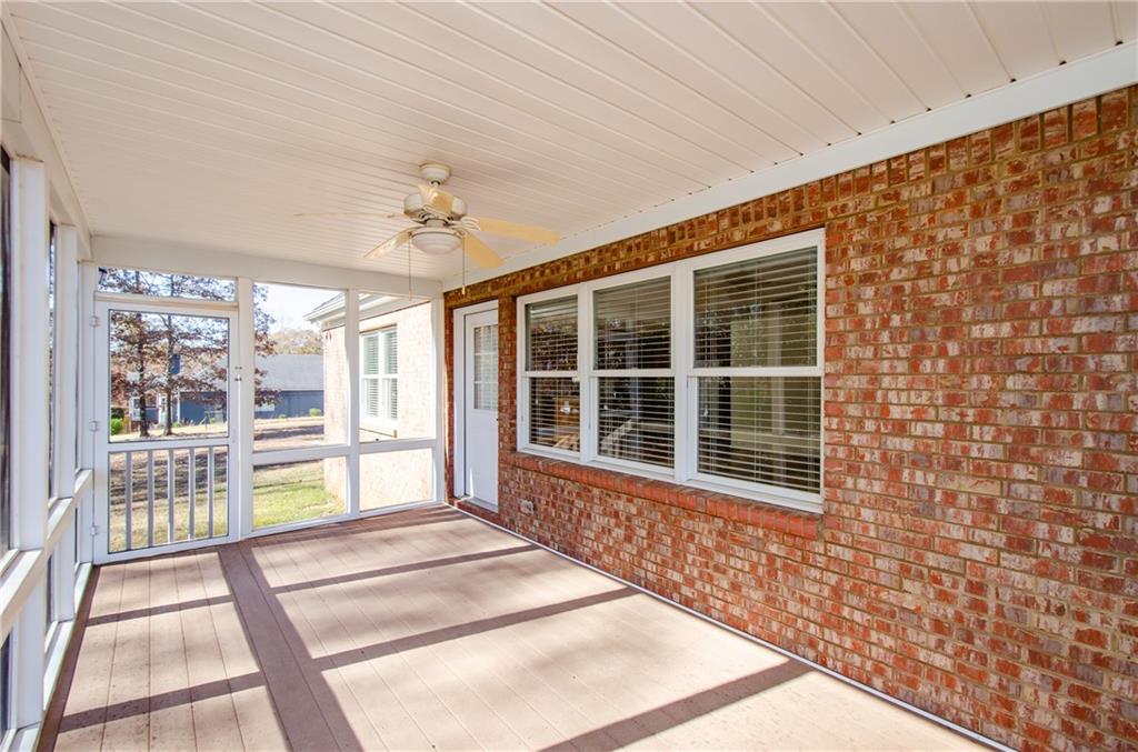 3950 Chattahoochee Road Cumming, GA 30041 - Photo 40 of 45 a view of a house with a swimming pool