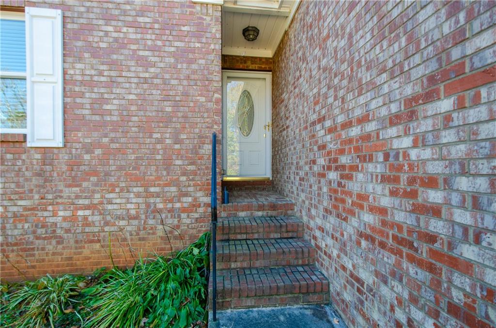 3950 Chattahoochee Road Cumming, GA 30041 - Photo 5 of 45 a picture of a door of a house