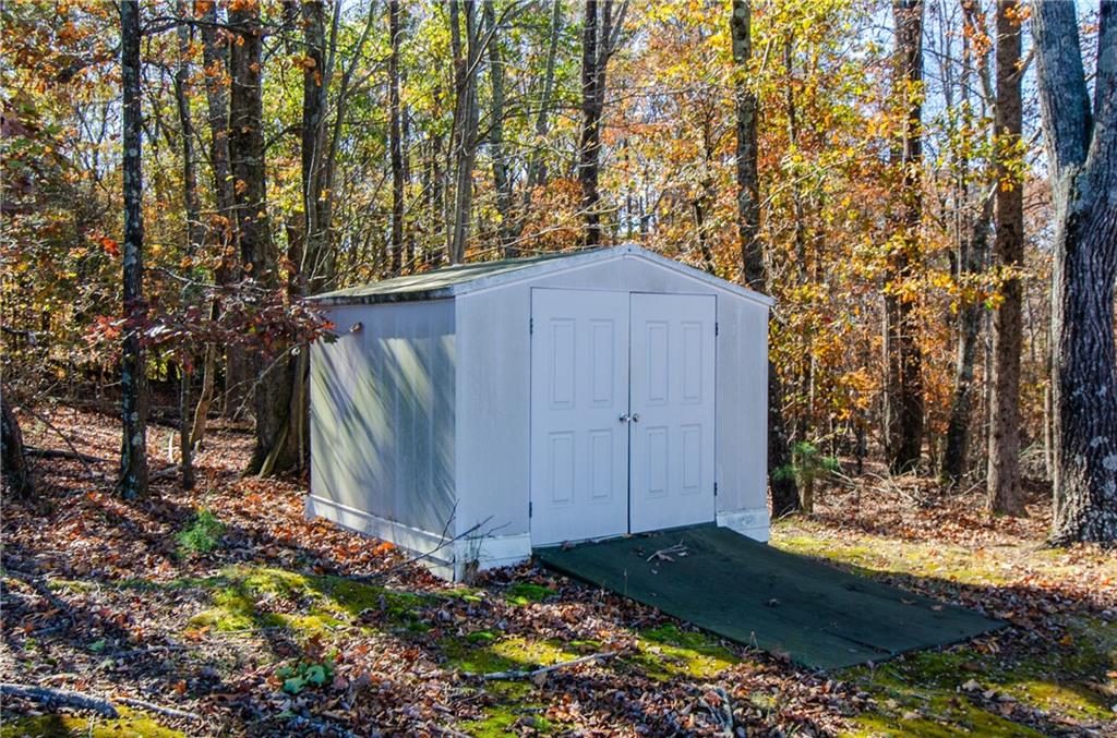 3950 Chattahoochee Road Cumming, GA 30041 - Photo 8 of 45 a backyard of a house