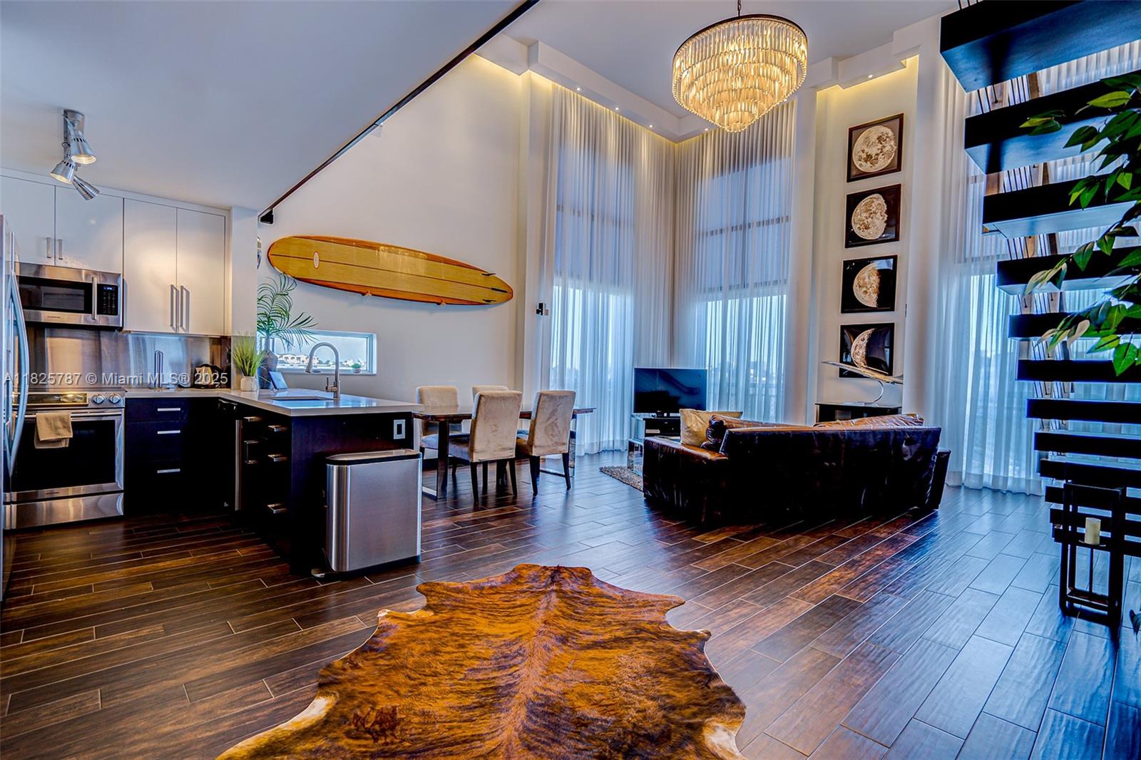 1701 Sunset Harbour Drive, Unit L507 Miami Beach, FL 33139 - Photo 1 of 28 a living room with furniture and wooden floor