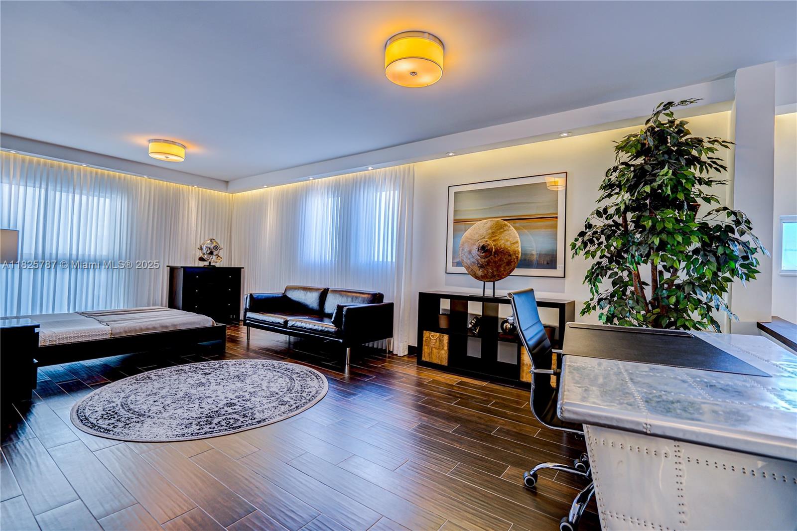 1701 Sunset Harbour Drive, Unit L507 Miami Beach, FL 33139 - Photo 14 of 28 a living room with furniture and a wooden floor