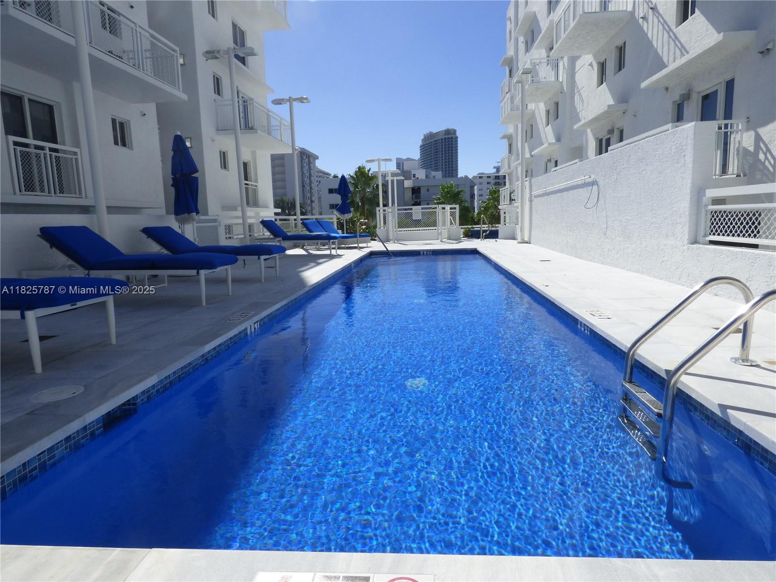 1701 Sunset Harbour Drive, Unit L507 Miami Beach, FL 33139 - Photo 18 of 28 a living room with furniture and a wooden floor