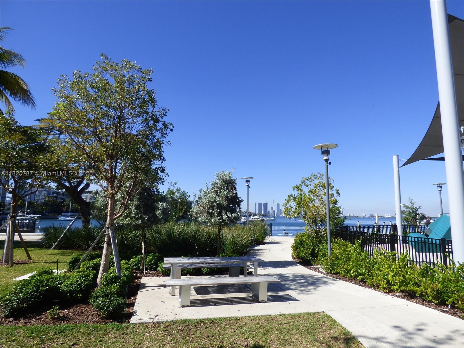 1701 Sunset Harbour Drive, Unit L507 Miami Beach, FL 33139 - Photo 26 of 28 a view of a backyard with plants and a patio