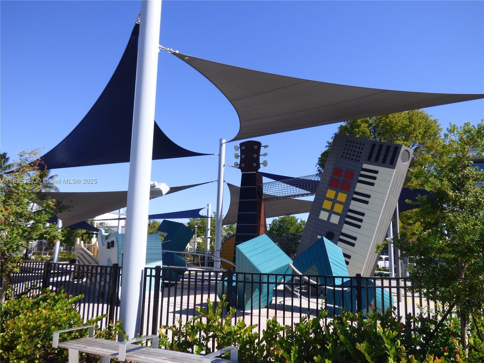 1701 Sunset Harbour Drive, Unit L507 Miami Beach, FL 33139 - Photo 28 of 28 a couple of chairs sitting in patio with a backyard