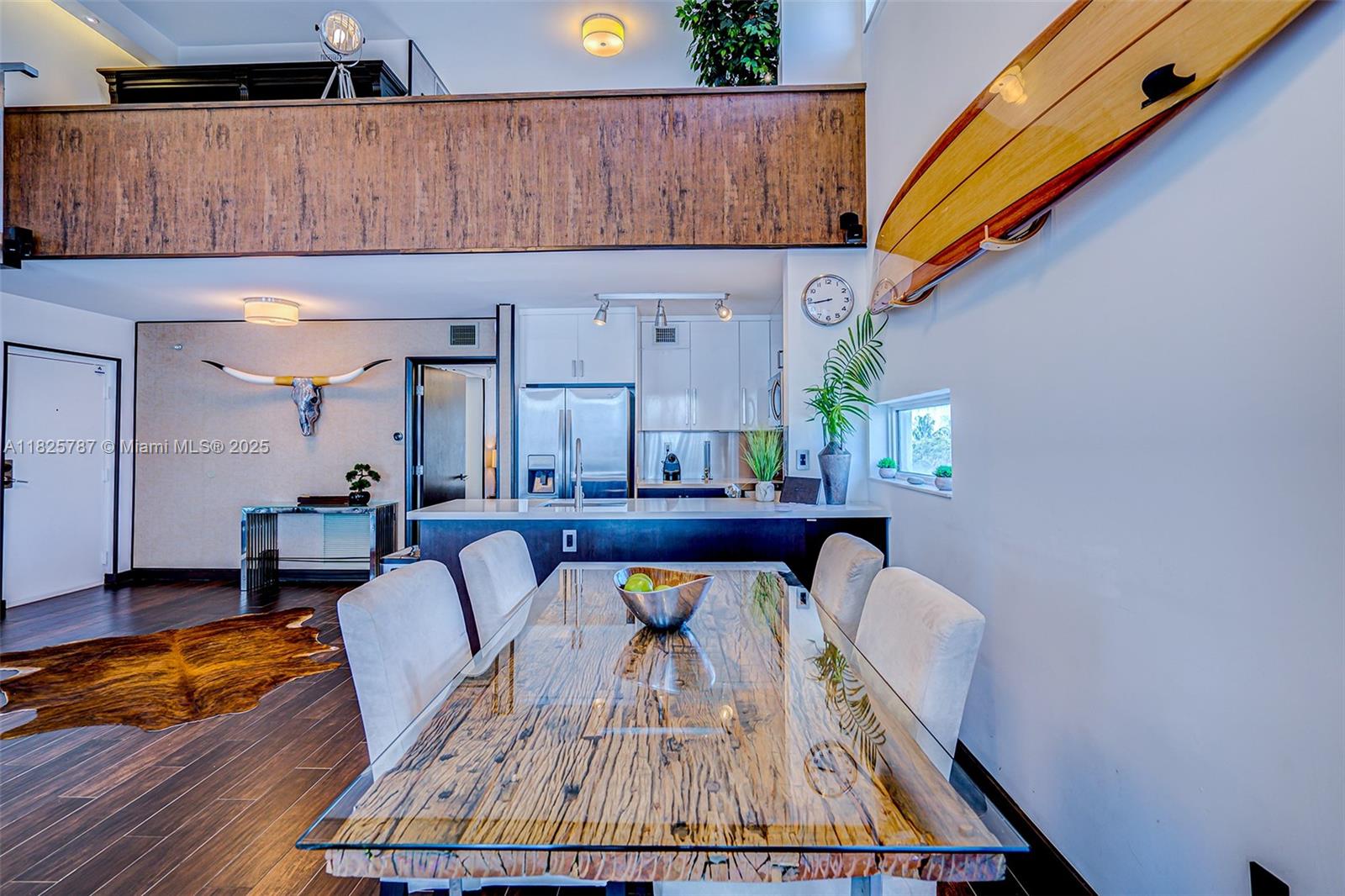 1701 Sunset Harbour Drive, Unit L507 Miami Beach, FL 33139 - Photo 3 of 28 a view of a dining room with furniture and wooden floor