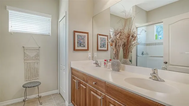 a view of a livingroom with furniture and a window