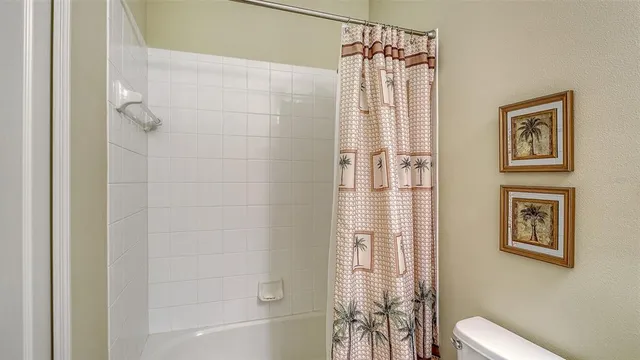 a view of a chairs and table in a backyard
