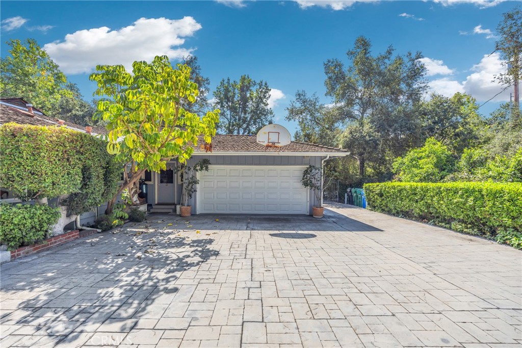 827 Hampton Road Arcadia, CA 91006 - Photo 22 of 37 a front view of a house with a yard and trees