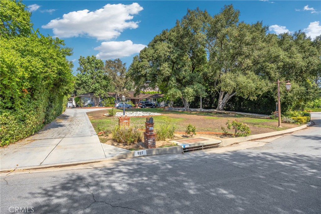 827 Hampton Road Arcadia, CA 91006 - Photo 3 of 37 a view of a swimming pool with a yard