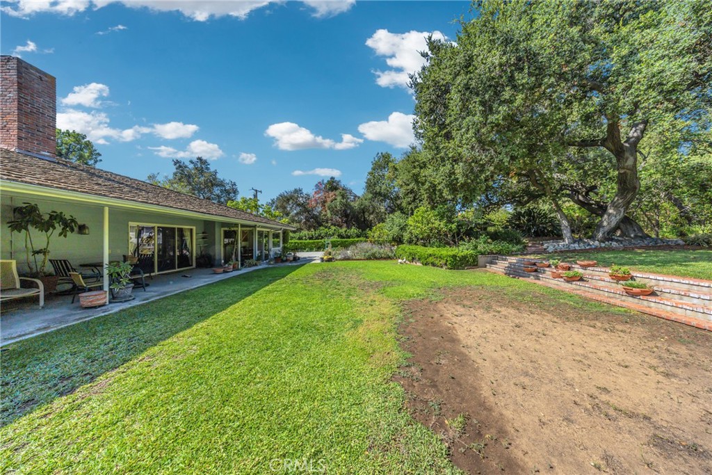 827 Hampton Road Arcadia, CA 91006 - Photo 31 of 37 a view of a house with backyard porch and sitting area