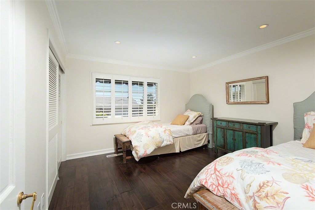 718 Emerald Bay Laguna Beach, CA 92651 - Photo 15 of 20 a bed room with two bed and a window