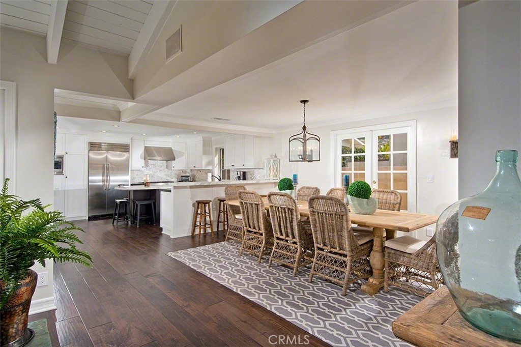 718 Emerald Bay Laguna Beach, CA 92651 - Photo 5 of 20 a view of a dining room with furniture window and wooden floor