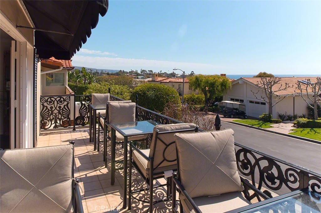 718 Emerald Bay Laguna Beach, CA 92651 - Photo 9 of 20 a view of a balcony with furniture