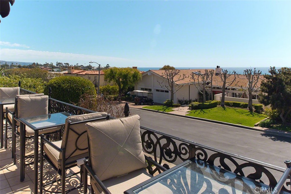 718 Emerald Bay Laguna Beach, CA 92651 - Photo 10 of 20 a view of a chairs and table on the terrace