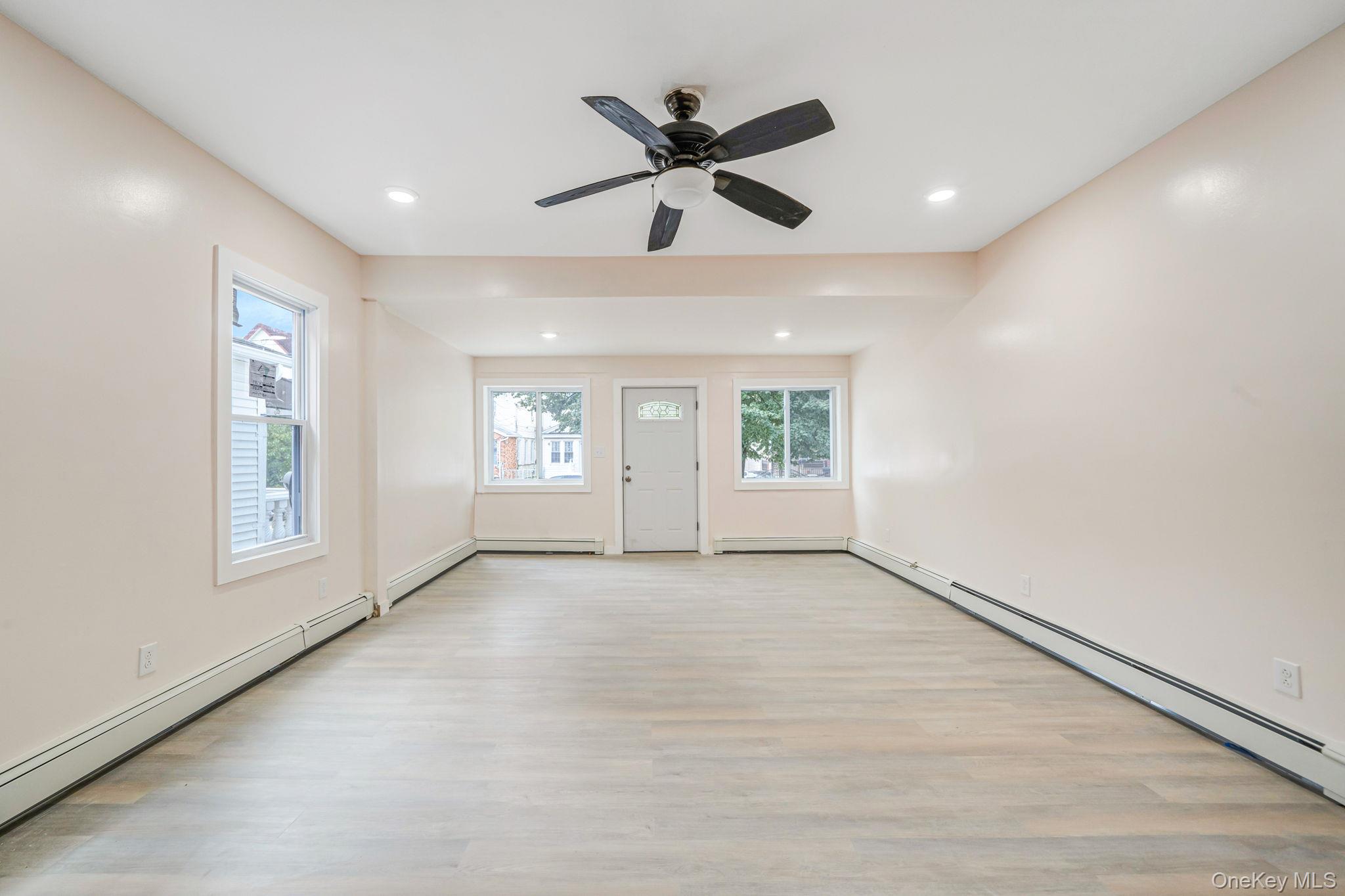 101-31 116th Street Queens, NY 11419 - Photo 15 of 19 a view of an empty room with a window