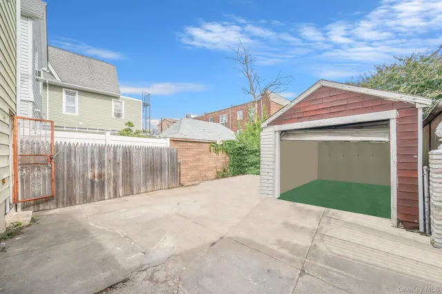a front view of a house with garage