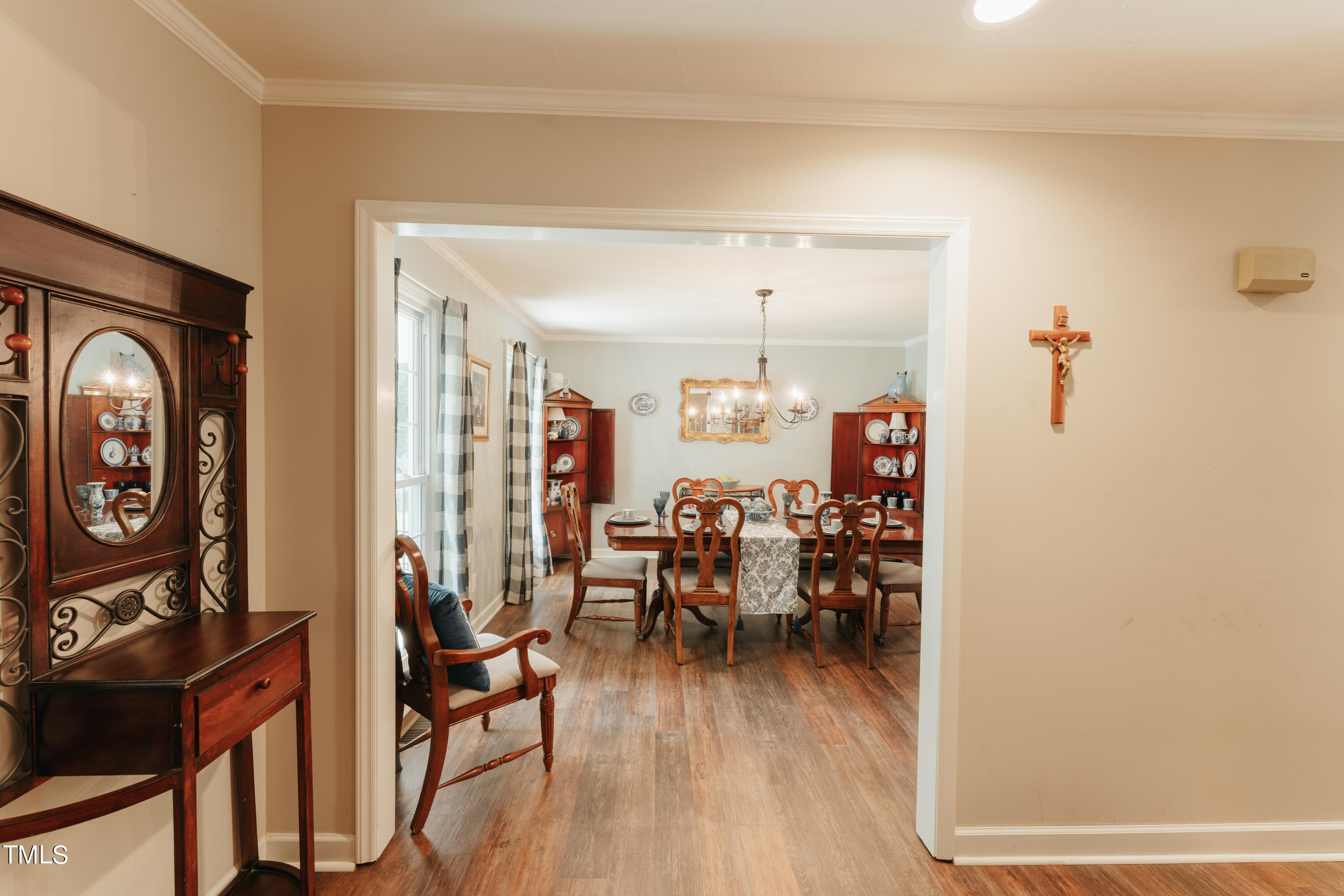 55 Sycamore Road Roxboro, NC 27574 - Photo 16 of 73 a view of a dining room with furniture window and wooden floor