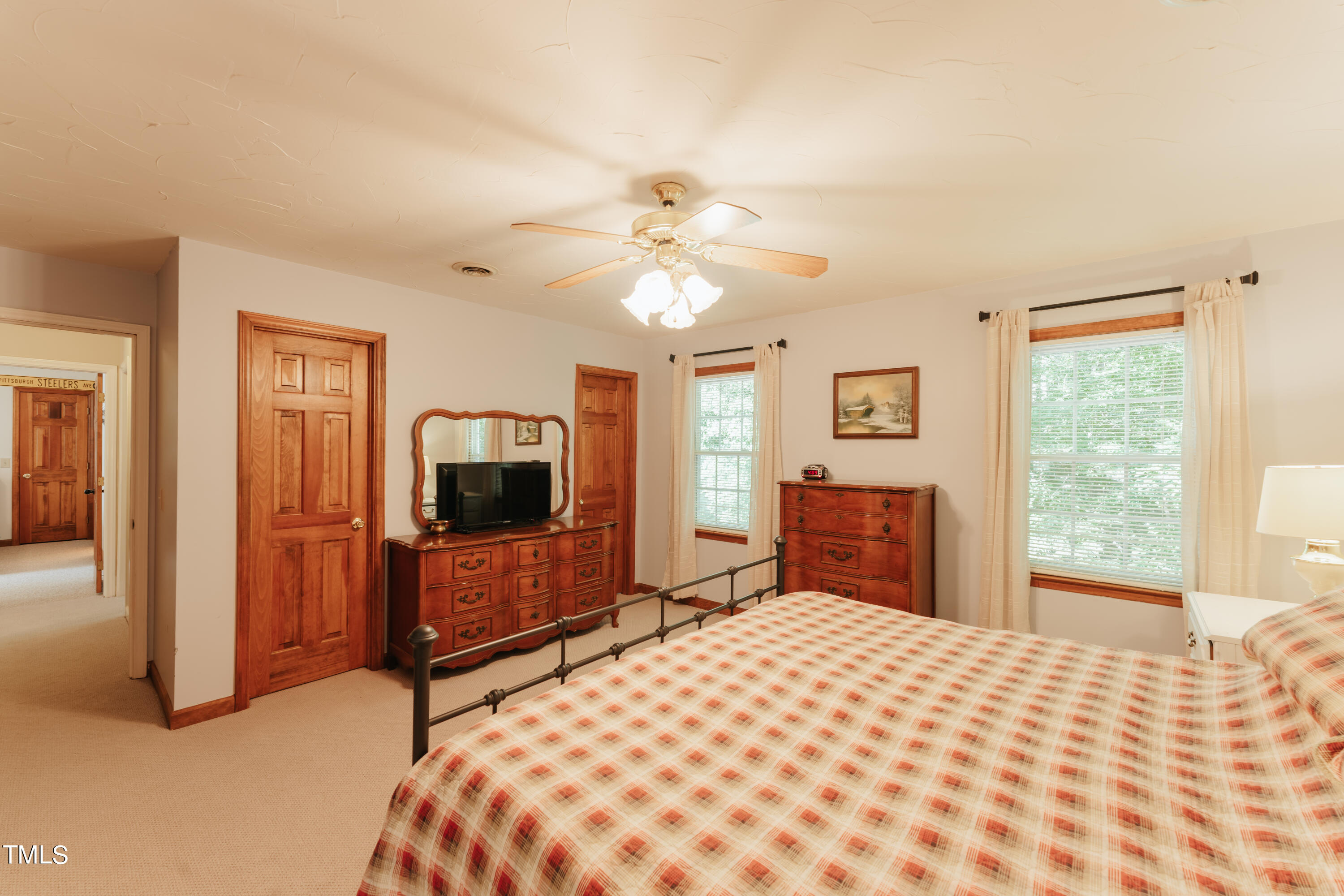 55 Sycamore Road Roxboro, NC 27574 - Photo 21 of 73 a bedroom with a bed and a television