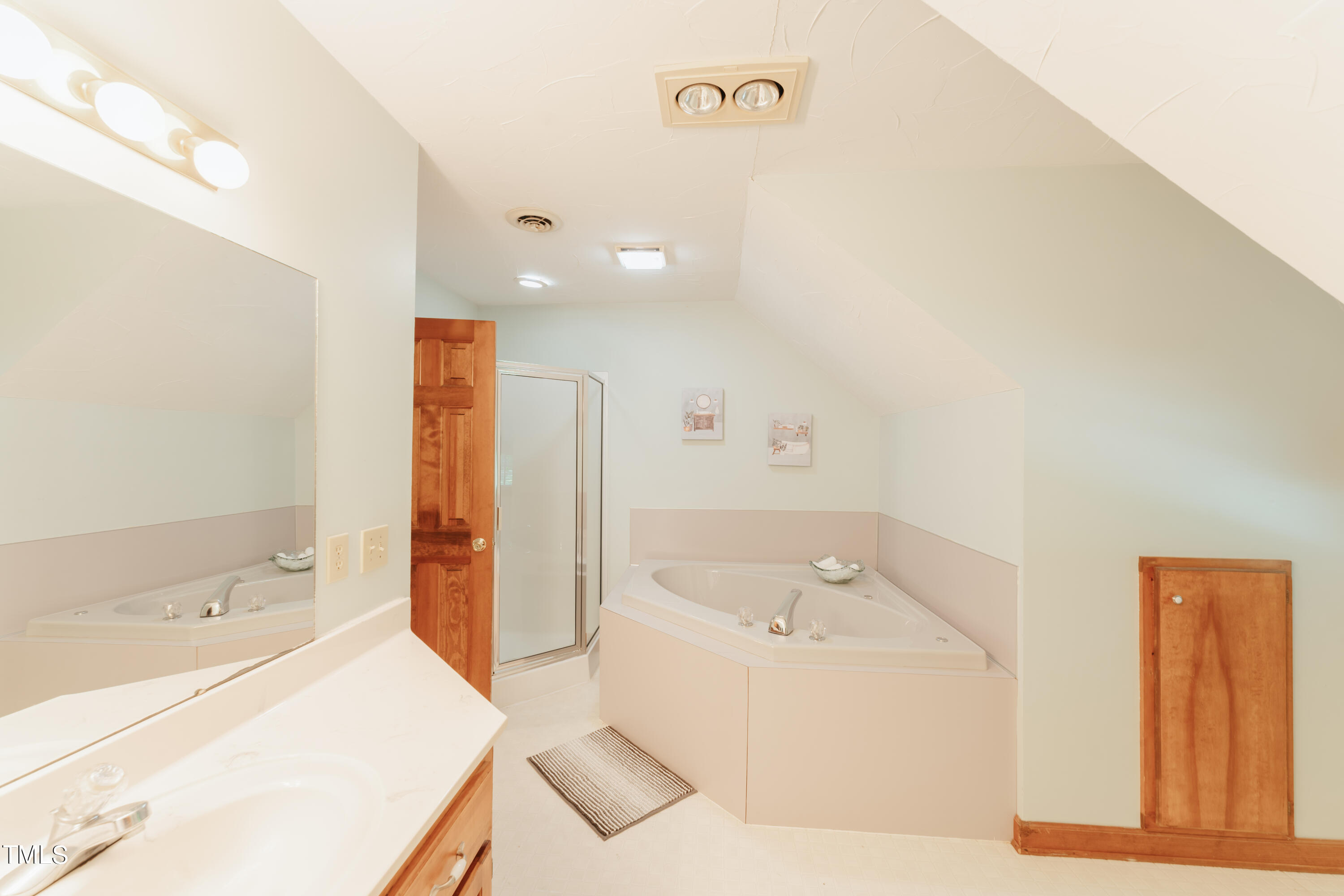 55 Sycamore Road Roxboro, NC 27574 - Photo 27 of 73 a bathroom with a bathtub and a sink