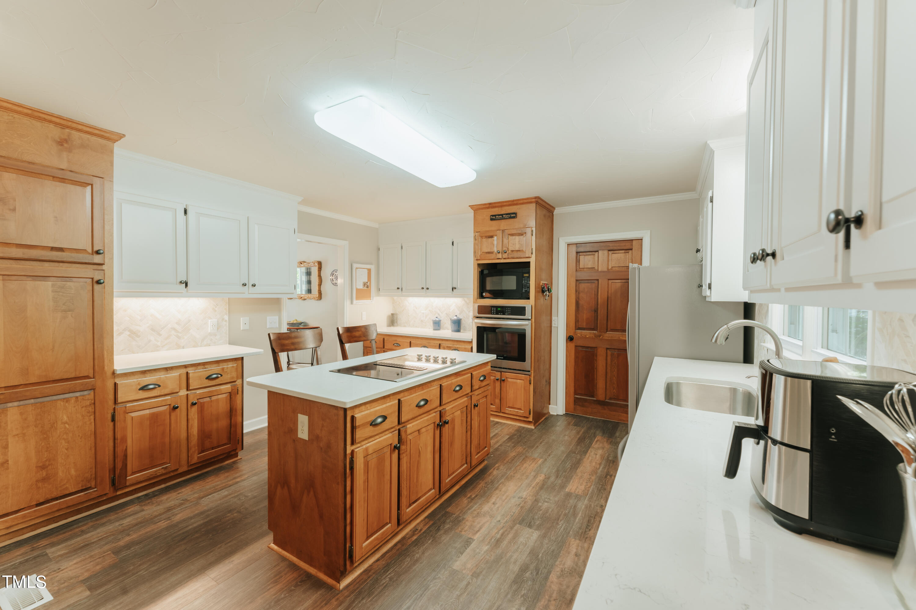 55 Sycamore Road Roxboro, NC 27574 - Photo 48 of 73 a kitchen with stainless steel appliances granite countertop a sink stove and refrigerator