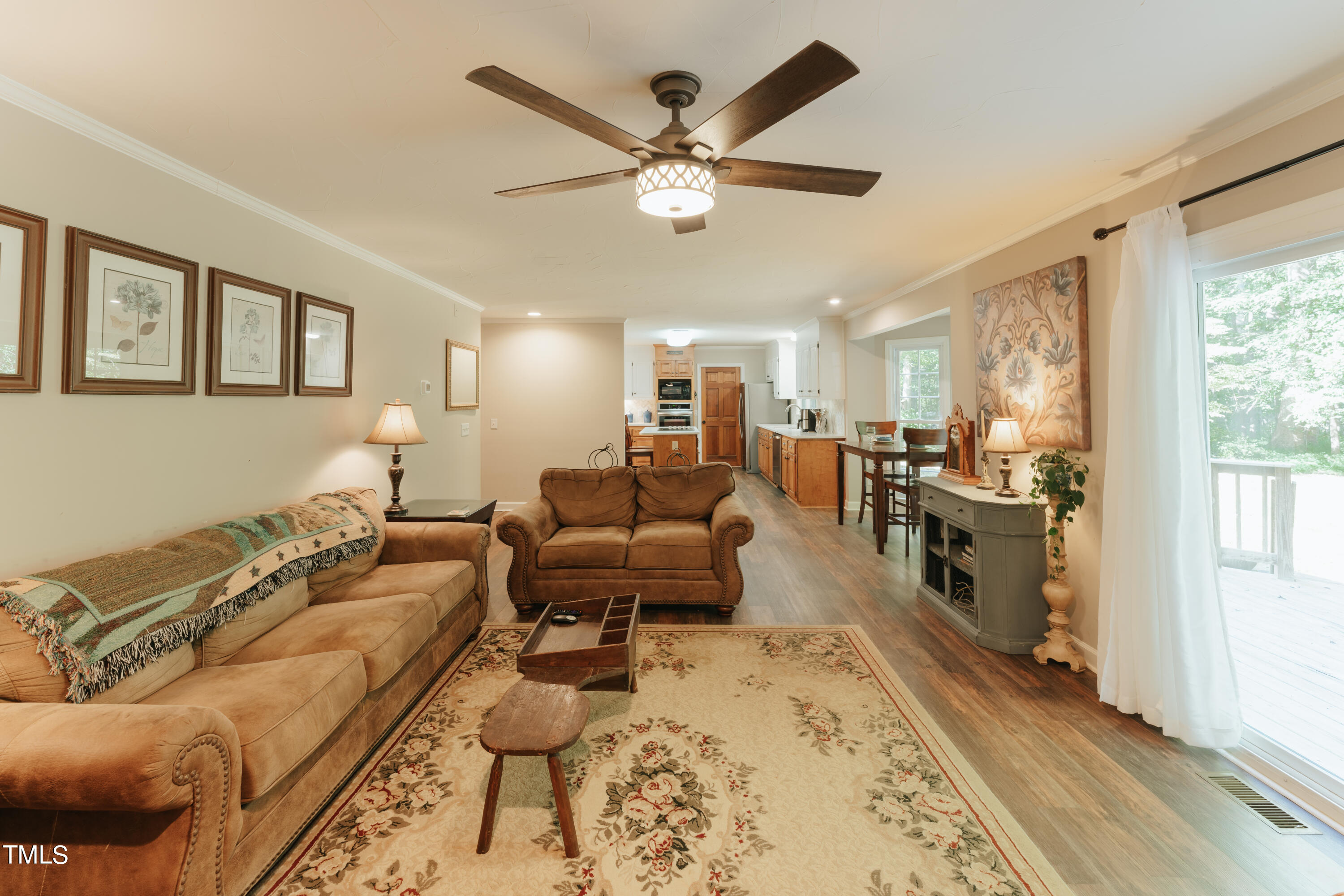 55 Sycamore Road Roxboro, NC 27574 - Photo 51 of 73 a living room with furniture and kitchen view