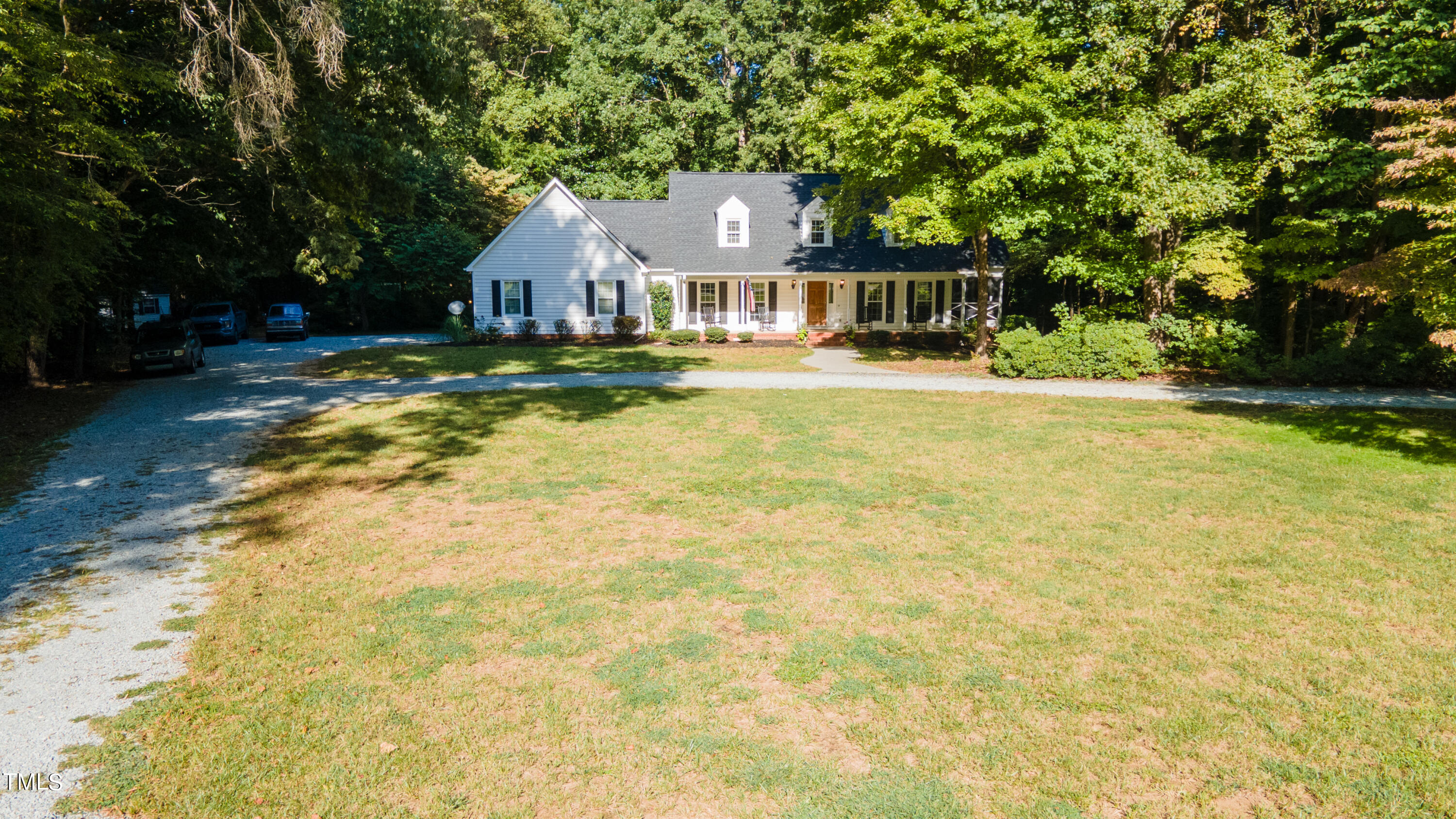 55 Sycamore Road Roxboro, NC 27574 - Photo 64 of 73 a front view of a house with a yard and garage