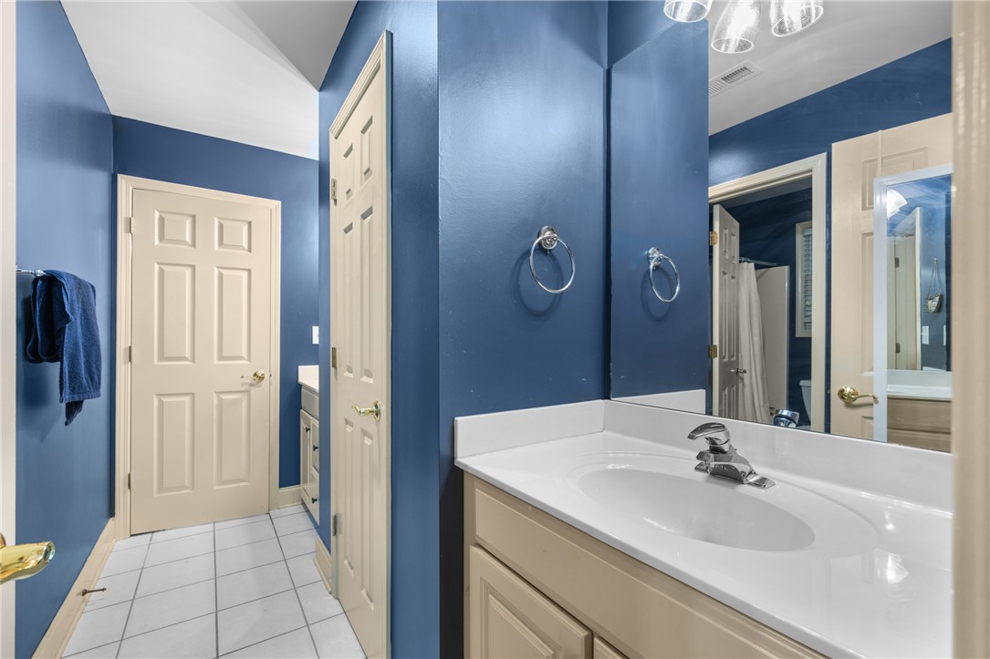106 Red Maple Way Clemson, SC 29631 - Photo 26 of 49 Gleaming ceramic tile floors complement a spacious vanity area with built-in storage cabinets.