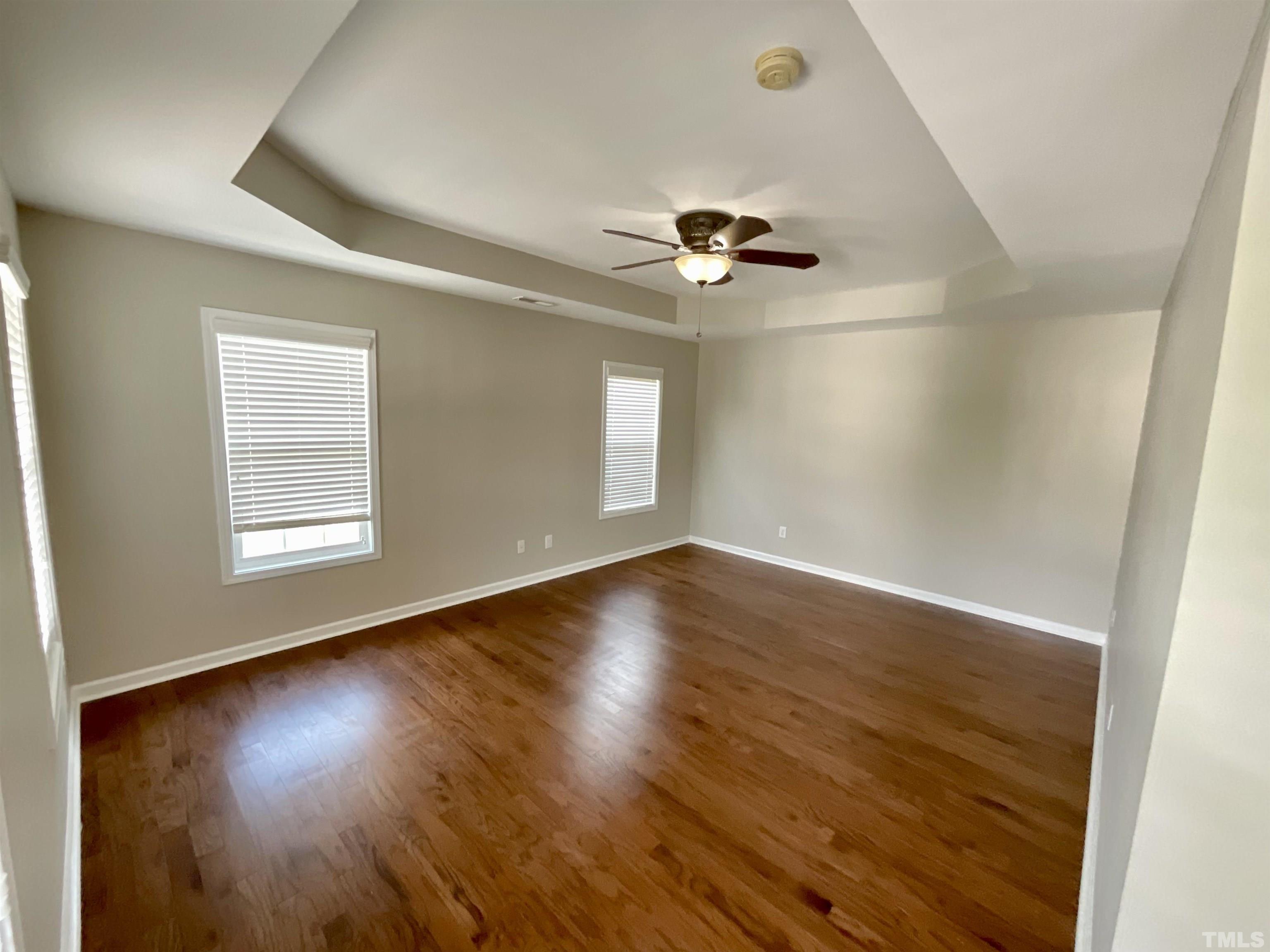 2632 Cloud Mist Circle Raleigh, NC 27614 - Photo 14 of 25 a view of empty room with wooden floor and fan