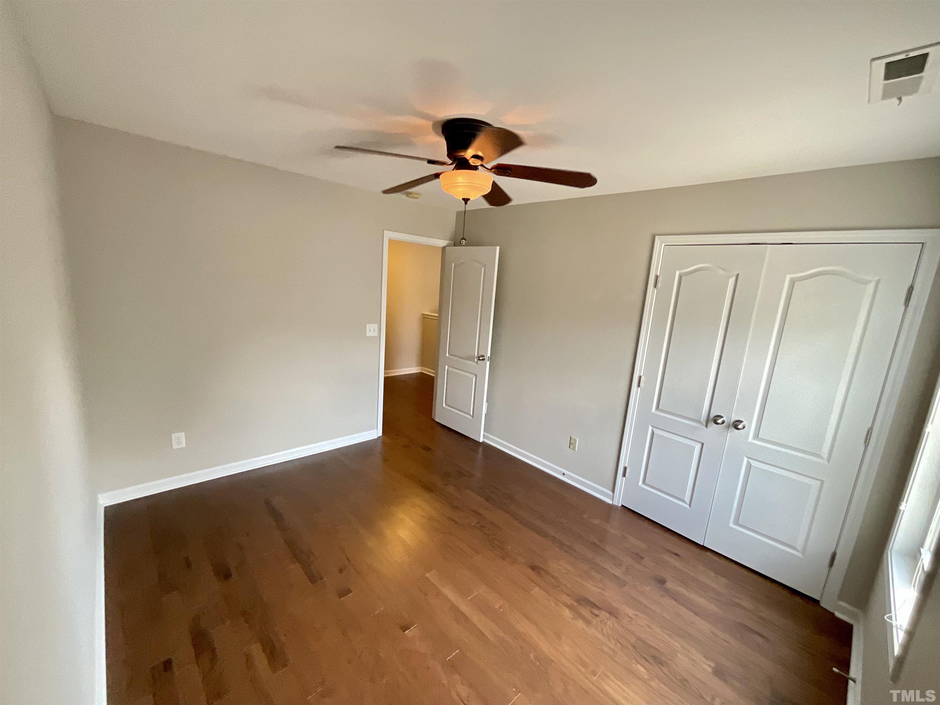 2632 Cloud Mist Circle Raleigh, NC 27614 - Photo 17 of 25 wooden floor in an empty room with a window