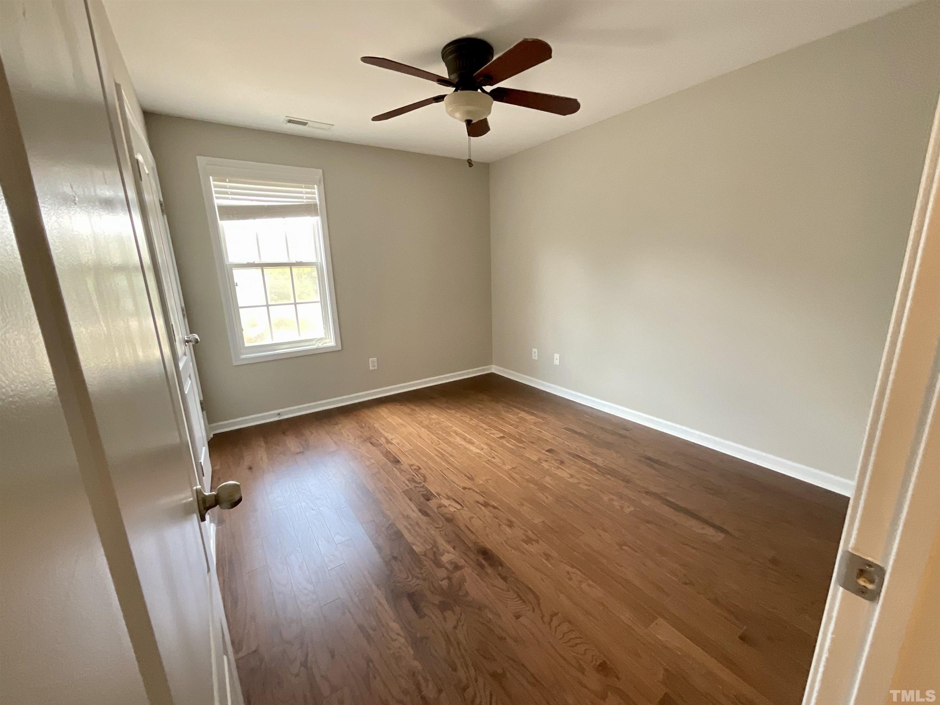 2632 Cloud Mist Circle Raleigh, NC 27614 - Photo 18 of 25 wooden floor in an empty room with a window