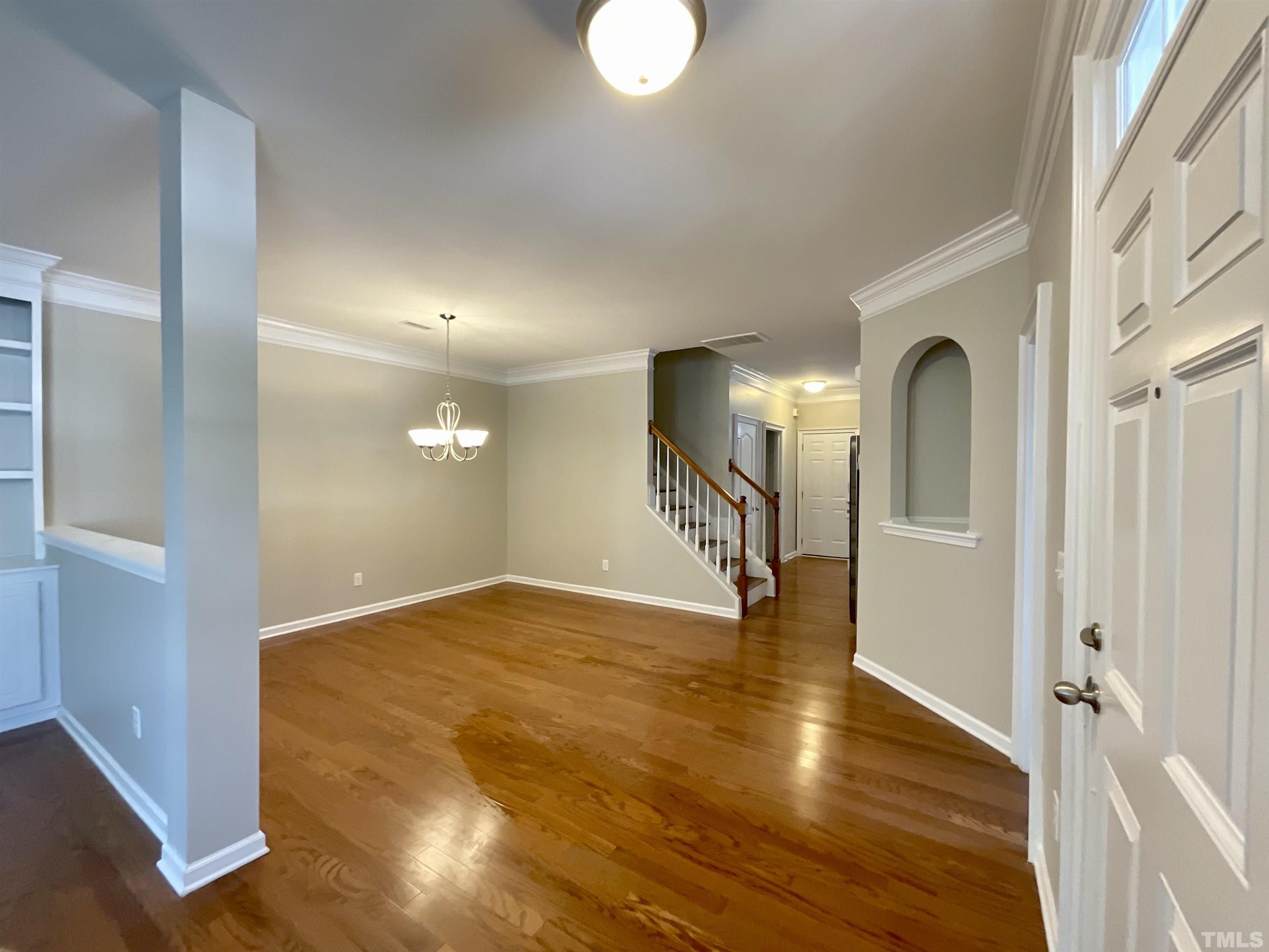 2632 Cloud Mist Circle Raleigh, NC 27614 - Photo 24 of 25 a view of a hallway with wooden floor