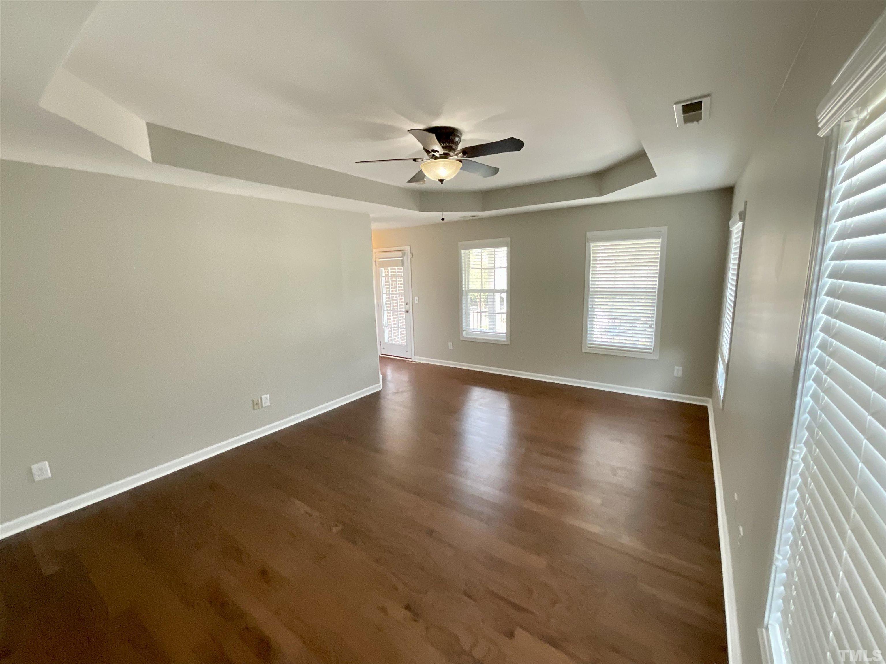 2632 Cloud Mist Circle Raleigh, NC 27614 - Photo 4 of 25 wooden floor in an empty room with a window