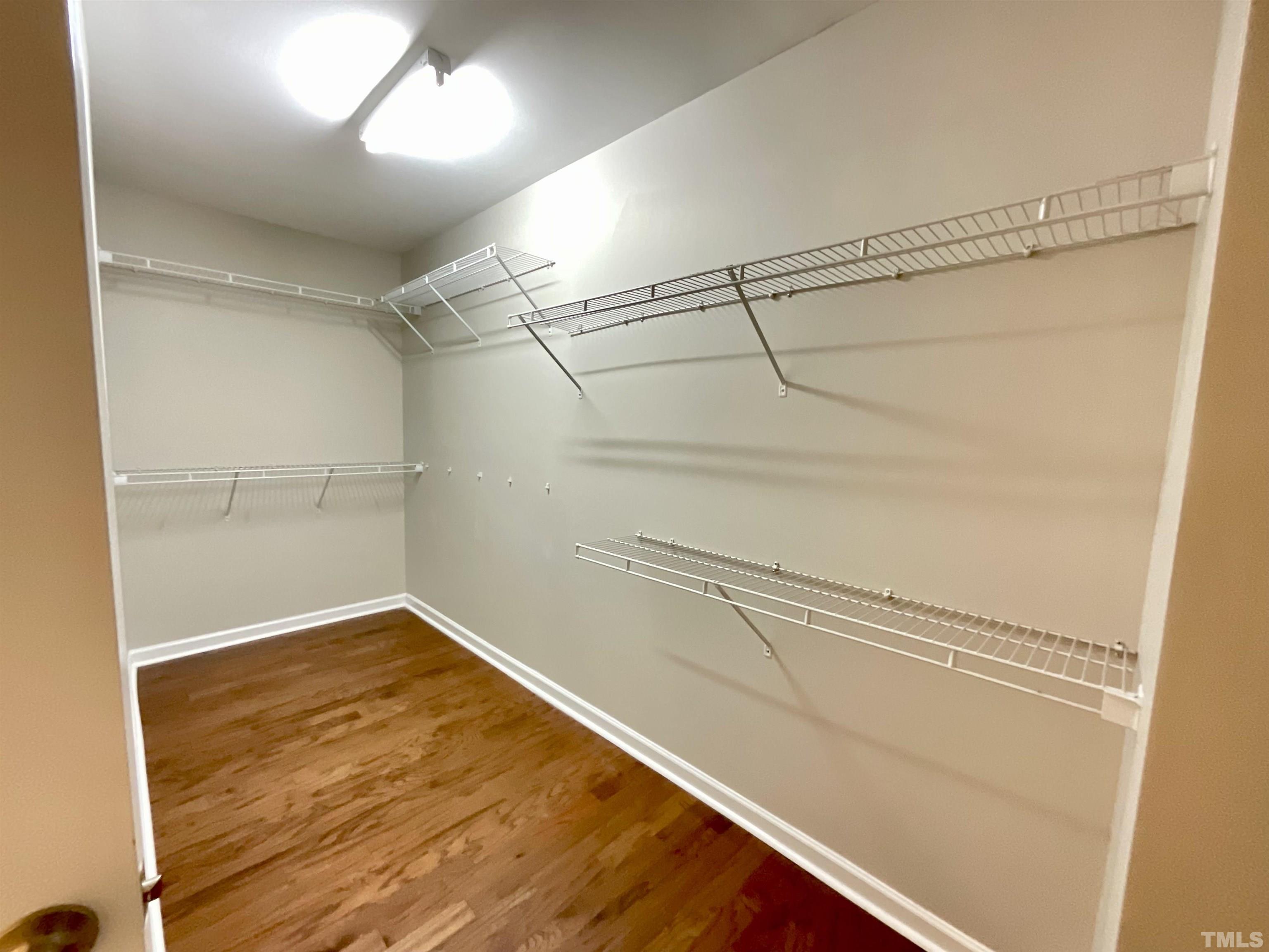 2632 Cloud Mist Circle Raleigh, NC 27614 - Photo 8 of 25 a view of a room with an empty walk in closet