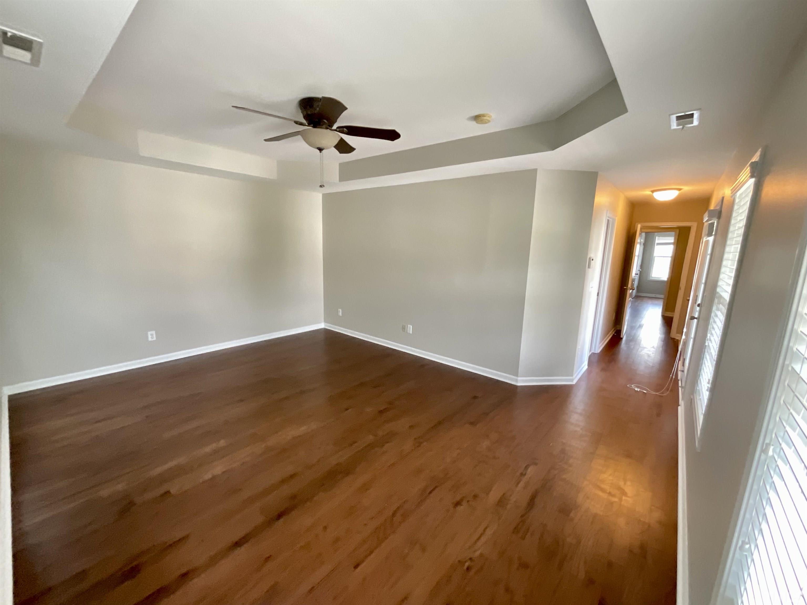 2632 Cloud Mist Circle Raleigh, NC 27614 - Photo 9 of 25 wooden floor in an empty room with a window