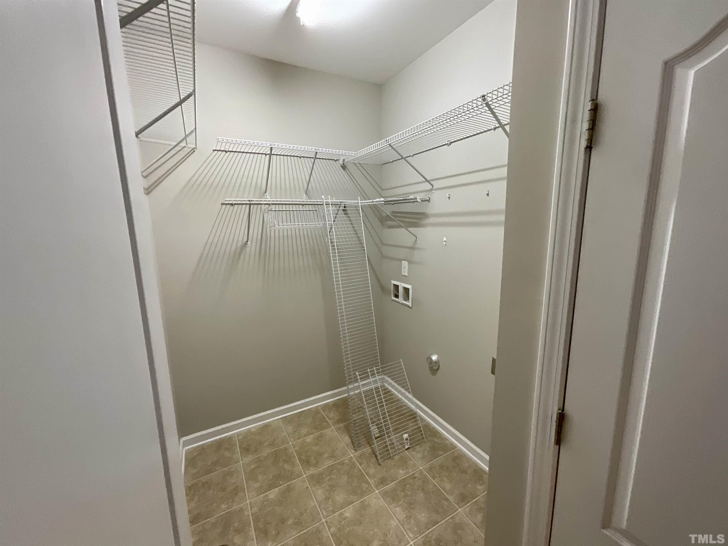 2632 Cloud Mist Circle Raleigh, NC 27614 - Photo 10 of 25 a bathroom with a glass shower door