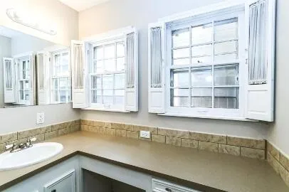 a bathroom with a sink and a bathtub