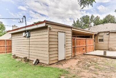 2711 22nd Street Lubbock, TX 79410 - Photo 27 of 28 a white house with a outdoor space