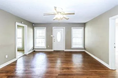 a kitchen with stainless steel appliances a refrigerator and a stove